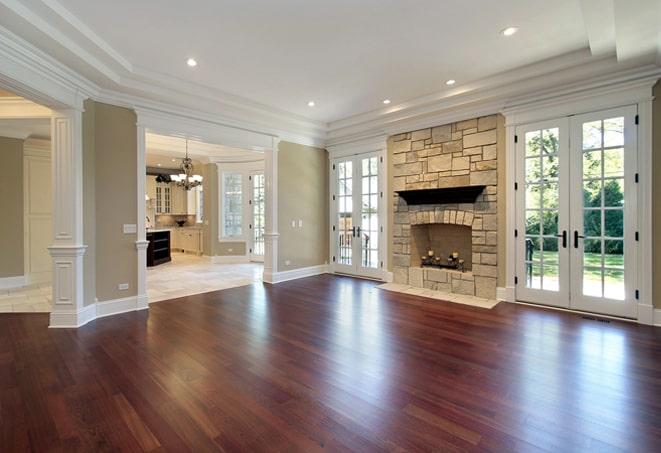 dark, hand-scraped wood flooring in a cozy den